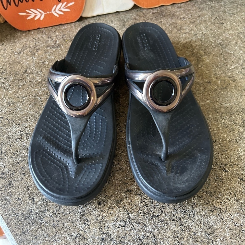 Crocs size 10 black, comfort, sandal with silver  accent